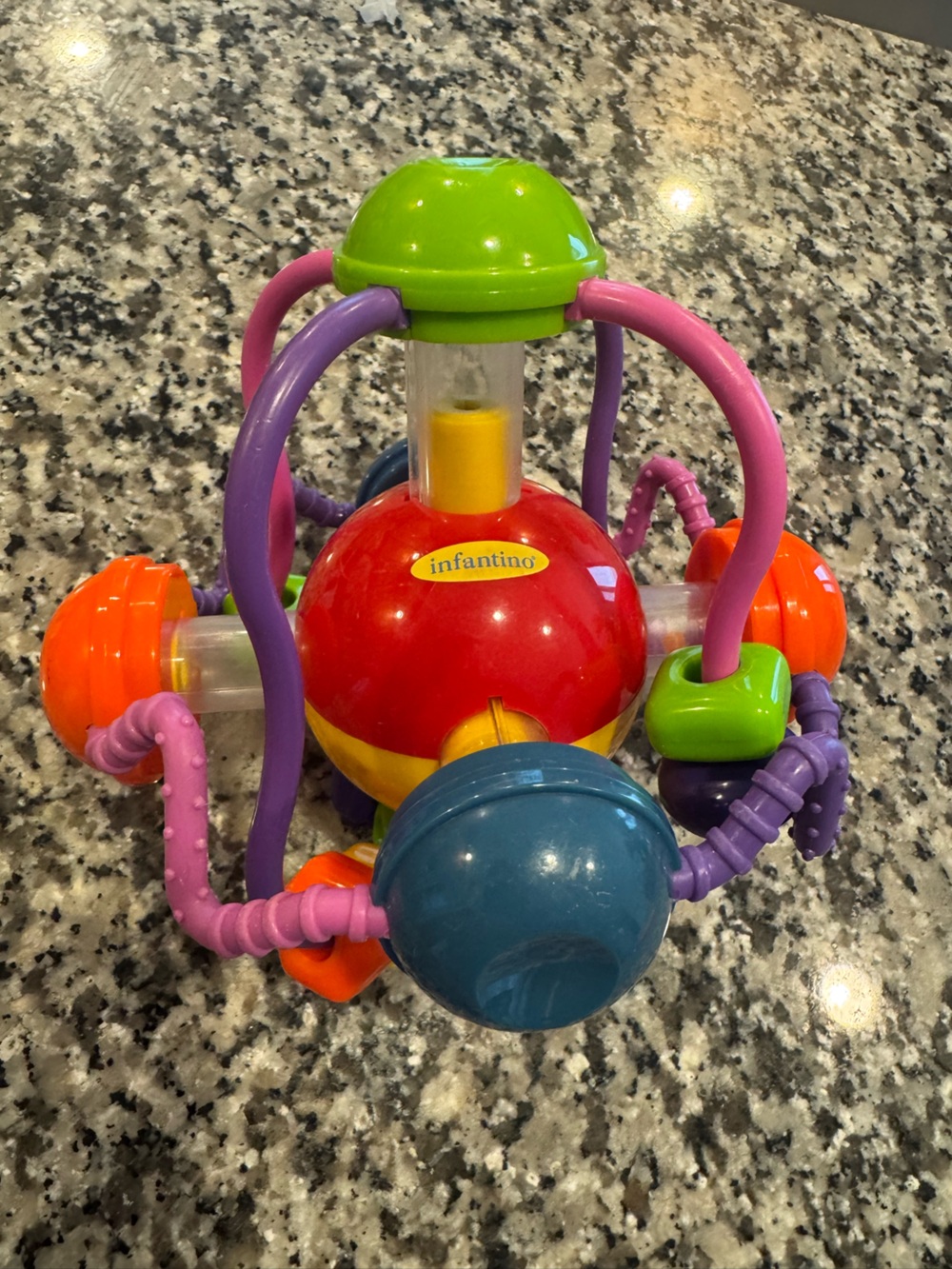Infantino rattle Colorful Sensory Activity Ball Toy - Red/Purple/Blue